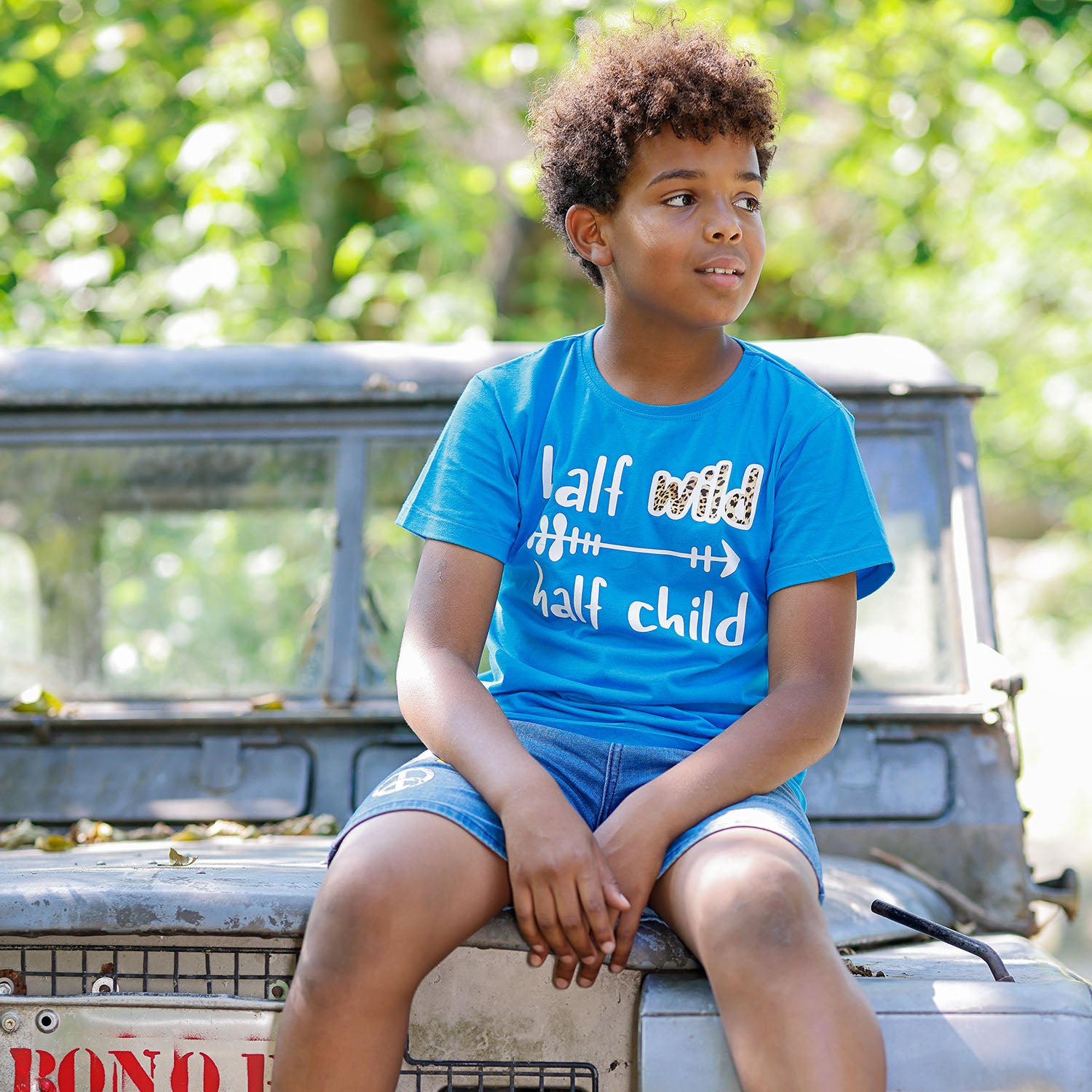 Half wild, Half child' kind shirt met korte mouwen