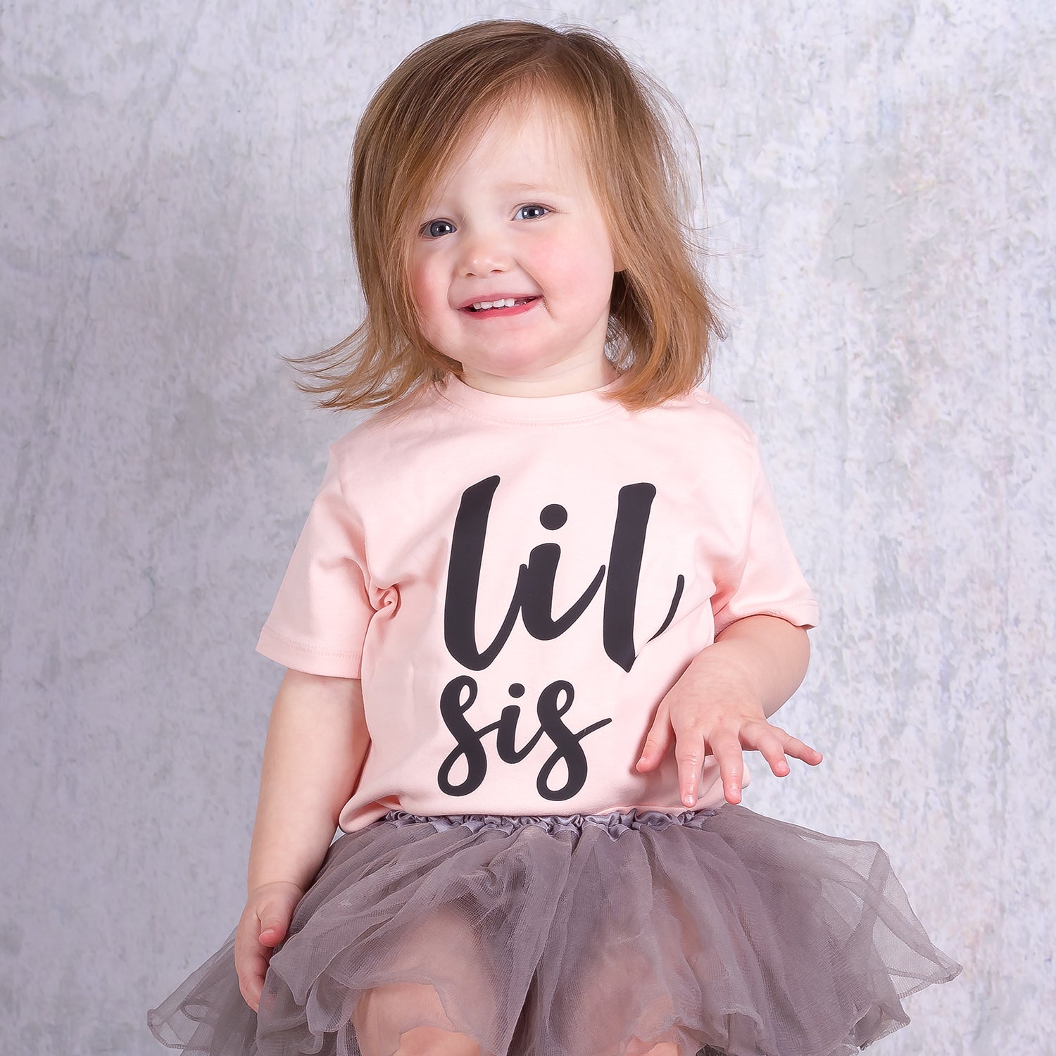 'Lil sis' baby shirt met korte mouwen
