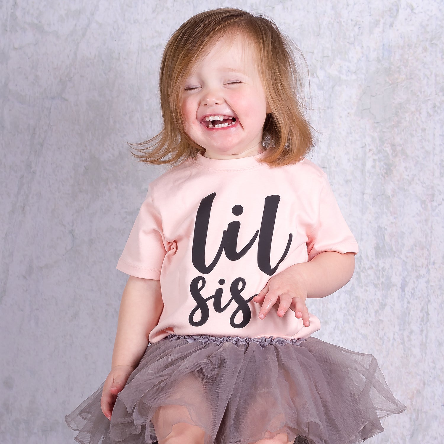 'Lil sis' baby shirt met korte mouwen