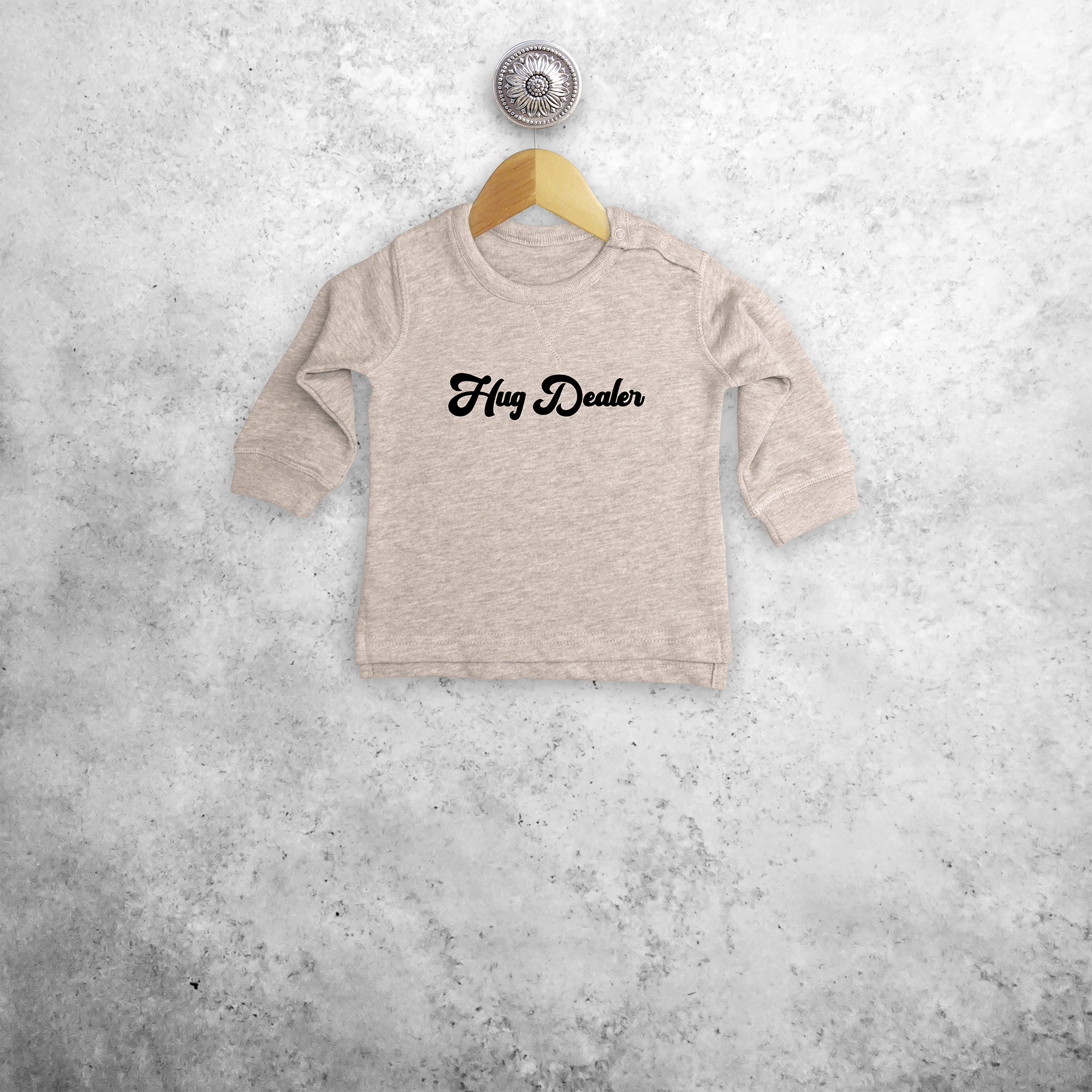 'Hug dealer' baby trui