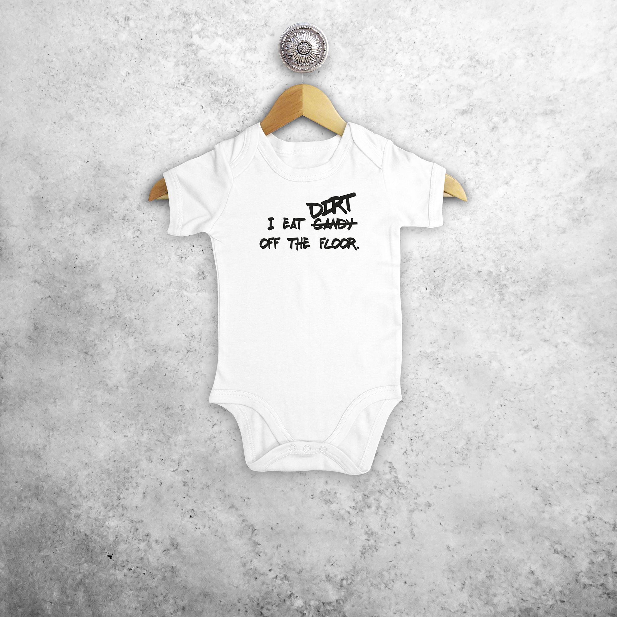 'I eat candy/dirt off the floor.' baby shortsleeve bodysuit