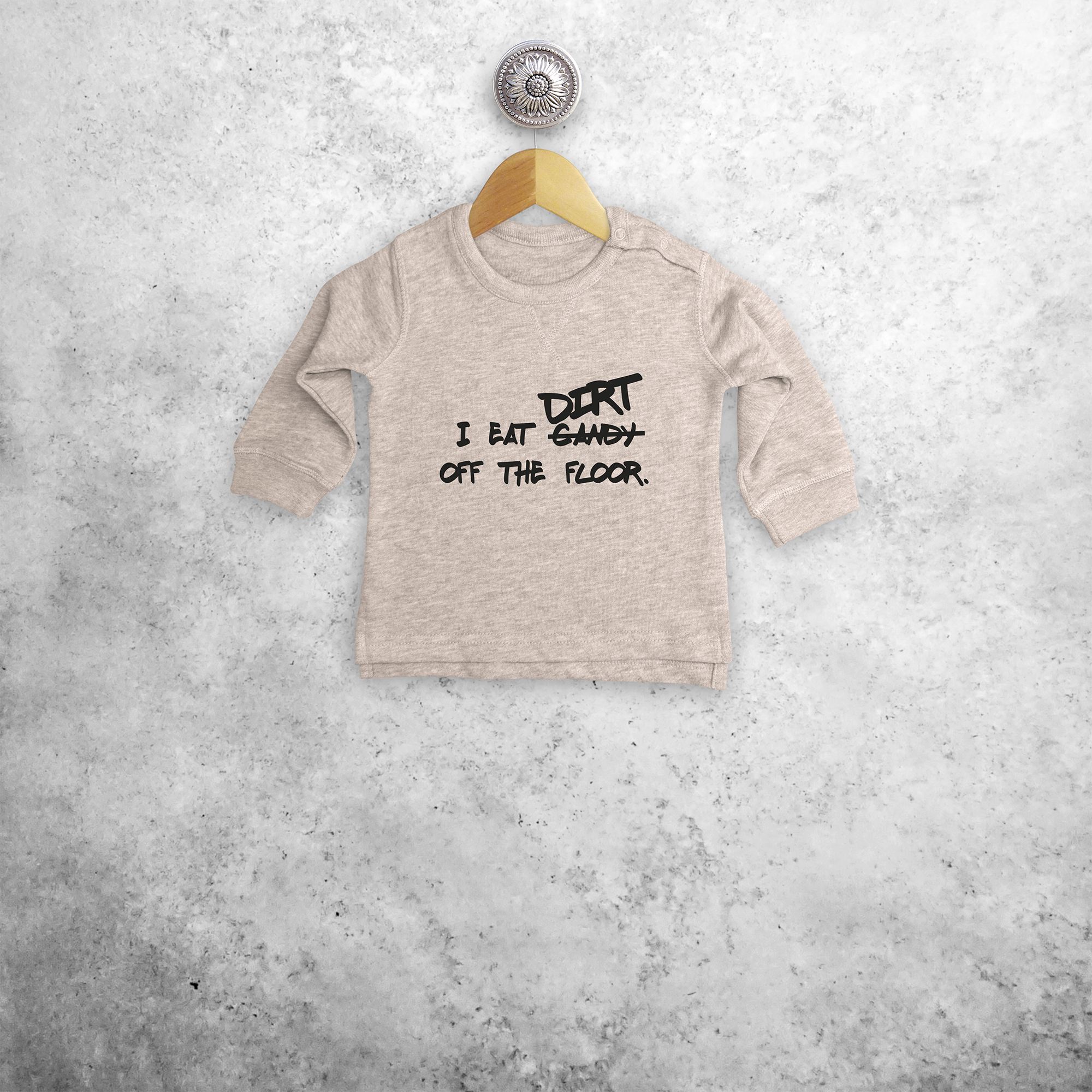 'I eat candy/dirt off the floor.' baby sweater