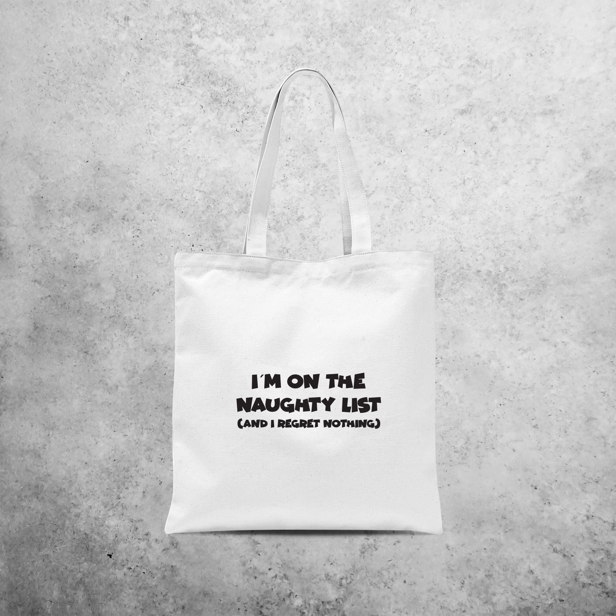 'I'm on the naughty list' tote bag