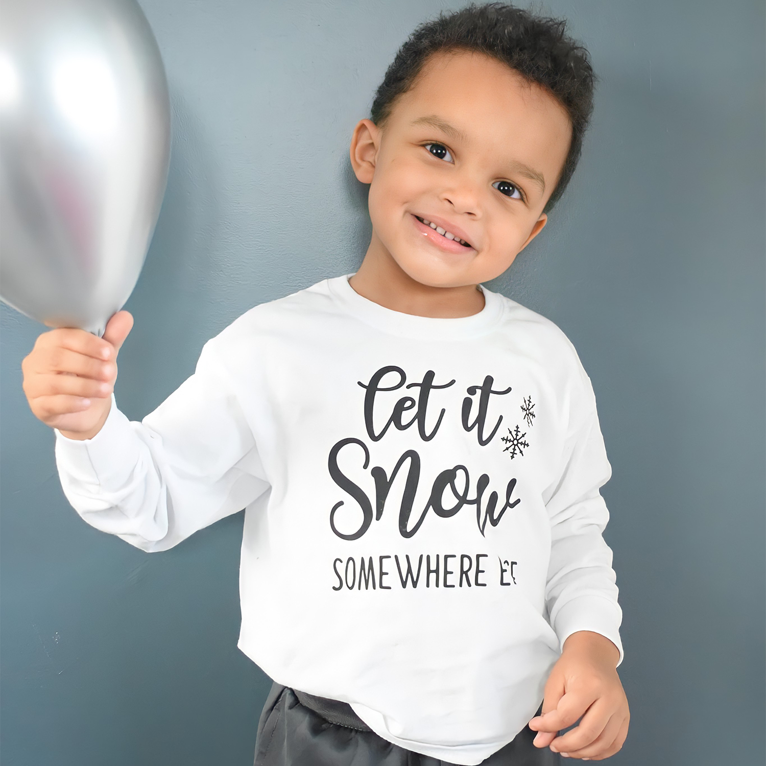 'Let it snow - somewhere else' kind shirt met lange mouwen