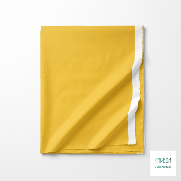 Solid amber yellow fabric