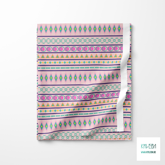 Geometric shapes in yellow, green, pink and purple fabric