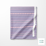 Geometric shapes in blue, purple and pink fabric