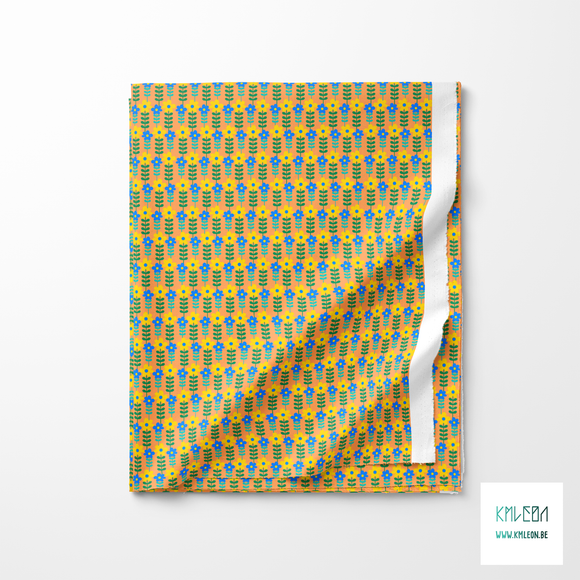 Yellow, blue and green flowers fabric