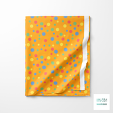 Random blue, green, yellow and coral polka dots fabric