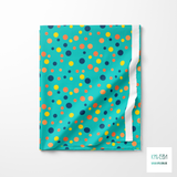 Random orange, yellow and navy polka dots fabric