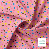 Random yellow, pink and blue polka dots fabric