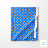 Random orange, blue and yellow circles fabric