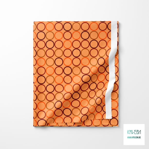 Random brown and orange circles fabric