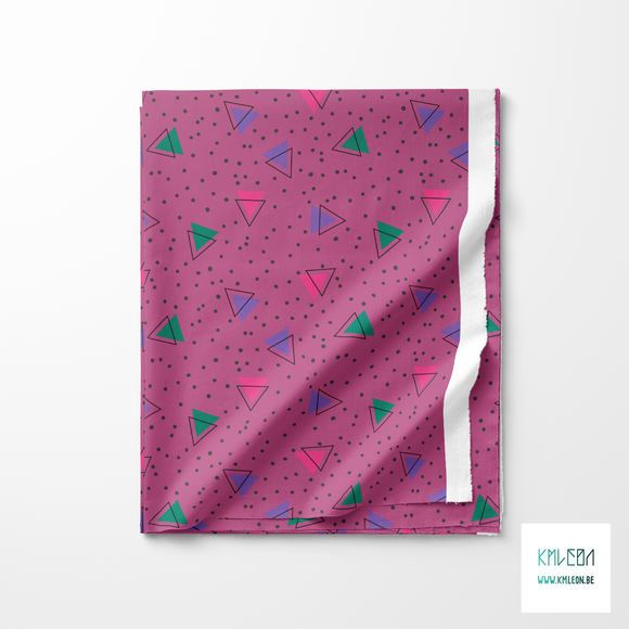 Green, purple, pink and black triangles and black dots fabric