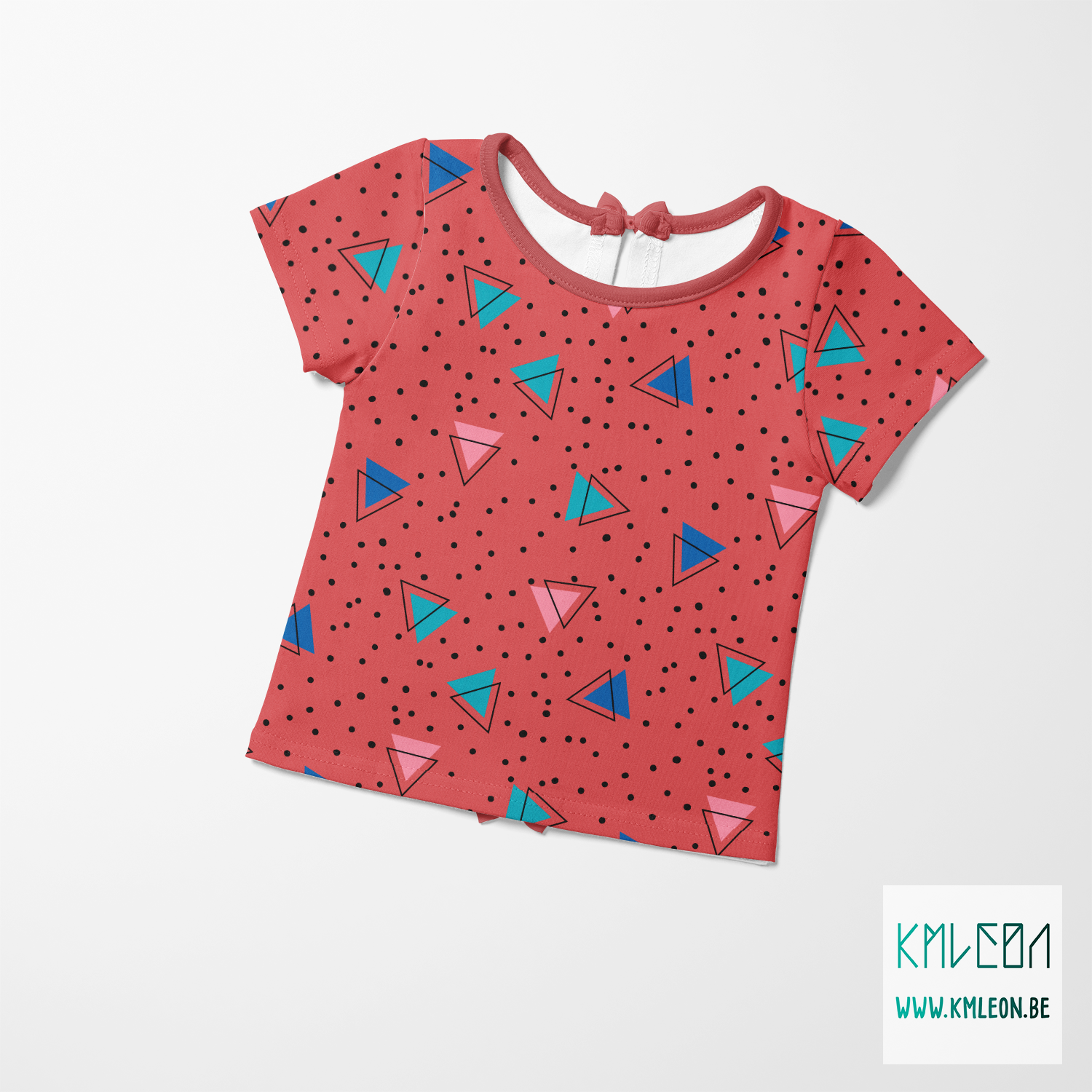 Teal, blue, pink and black triangles and black dots fabric