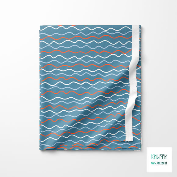 Irregular white, blue and orange waves fabric