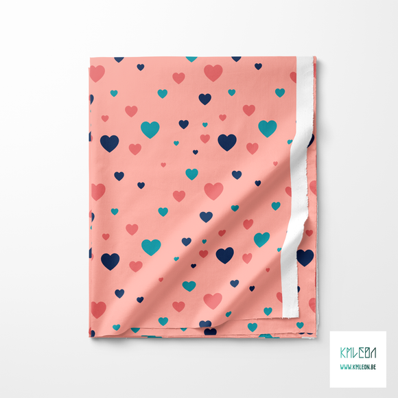 Pink, teal and navy hearts fabric