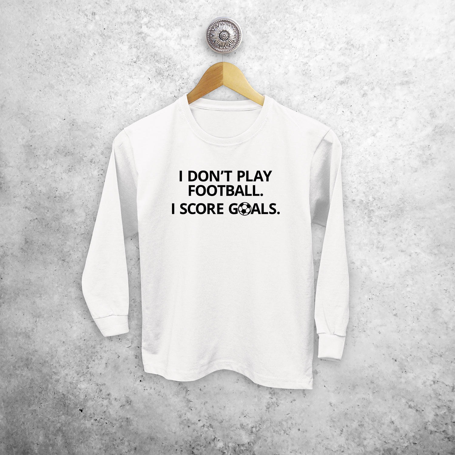 'I don't play football. I score goals.' kids longsleeve shirt
