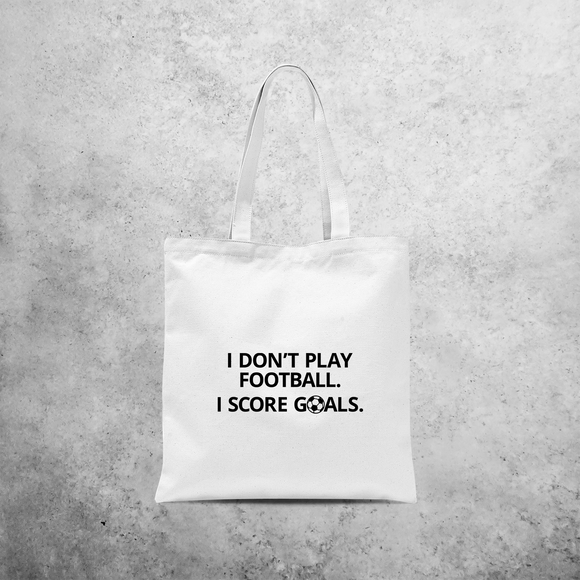 'I don't play football. I score goals.' tote bag