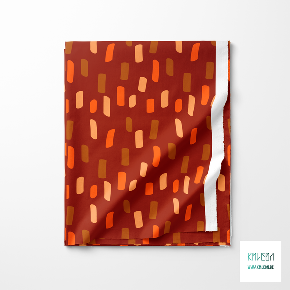 Beige, bruine en oranje onregelmatige strepen stof