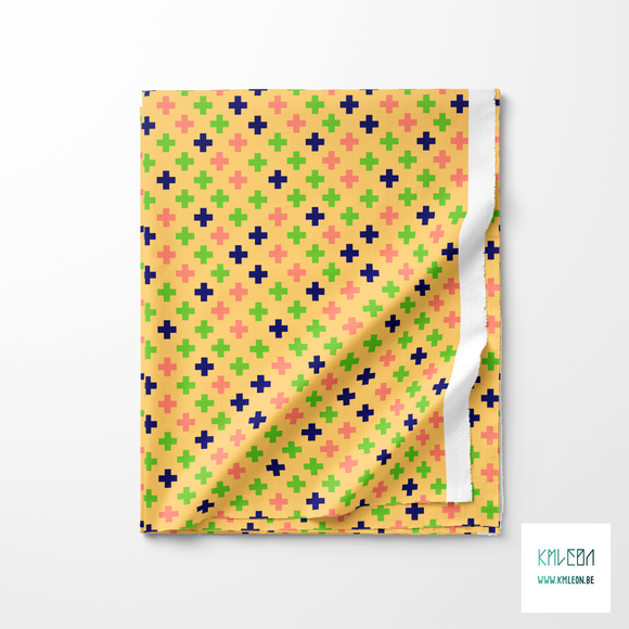 Blue, pink and green crosses fabric