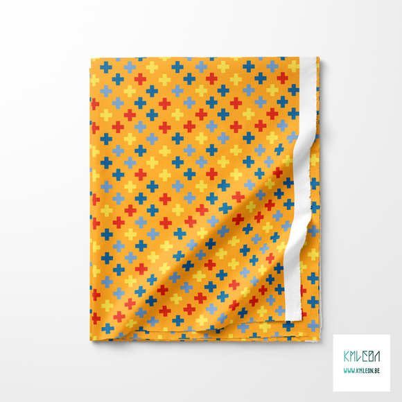 Yellow, red and blue crosses fabric