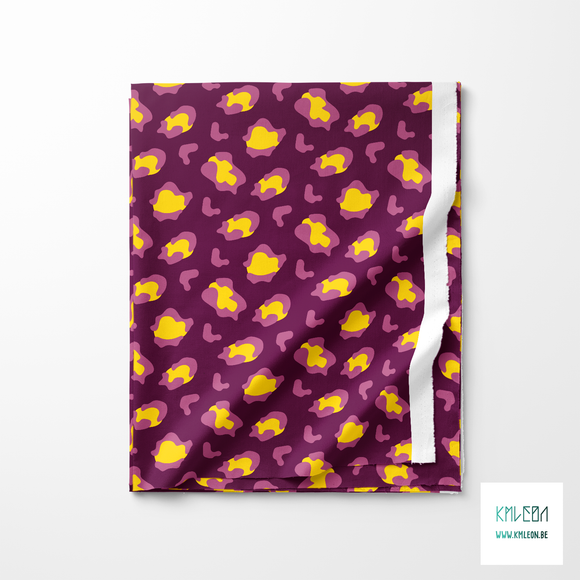 Yellow and pink leopard print fabric