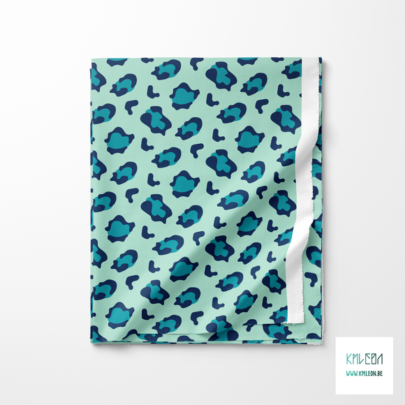 Teal and navy leopard print fabric