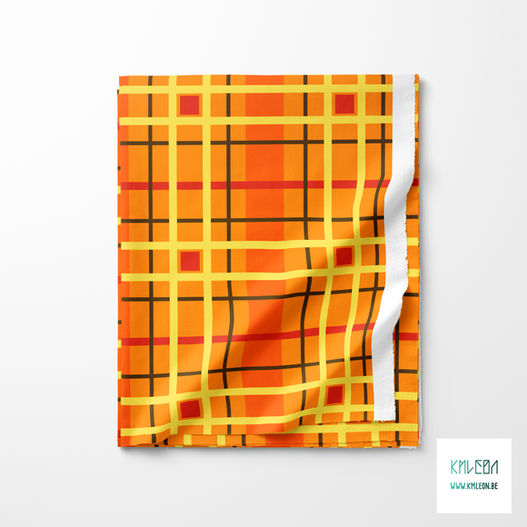 Yellow, red and brown plaid fabric