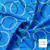 Blue, navy and teal interlocking rings fabric