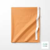 Solid sandy apricot fabric