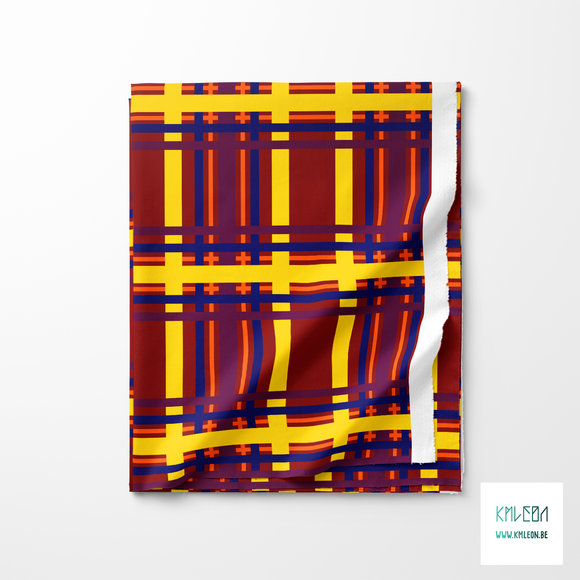 Yellow, blue, orange and purple tartan fabric