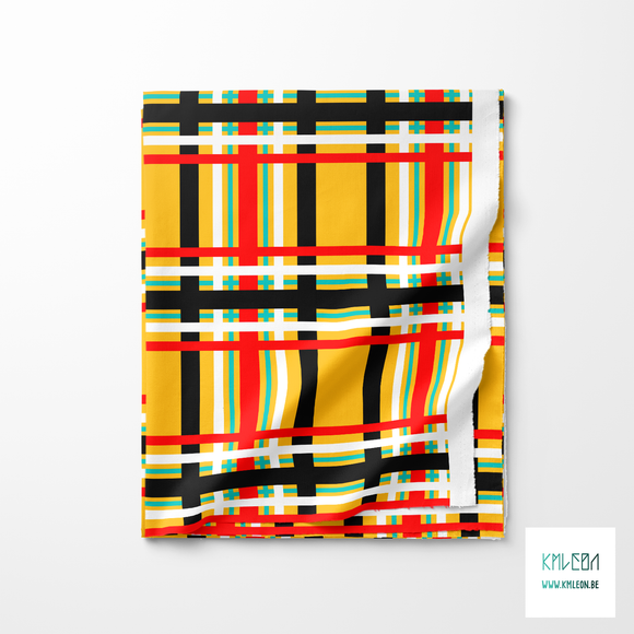 Red, teal, black and white tartan fabric