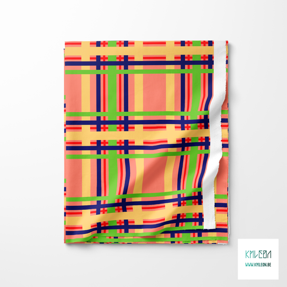 Green, blue, red and yellow tartan fabric