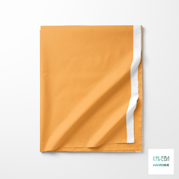 Solid tawny apricot fabric