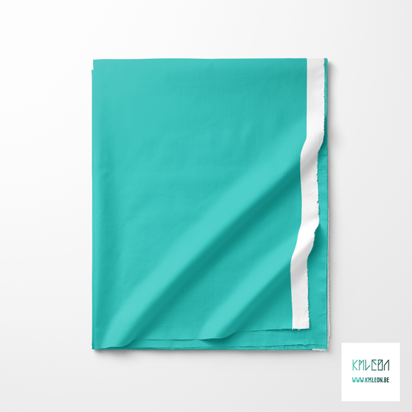 Solid teal fabric