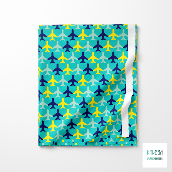 Yellow, mint green and blue airplanes and clouds fabric