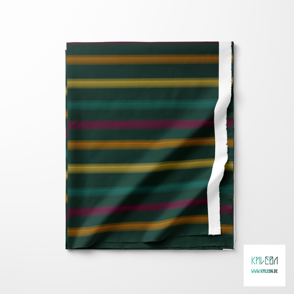 Soft horizontal stripes in green, purple, orange and yellow fabric