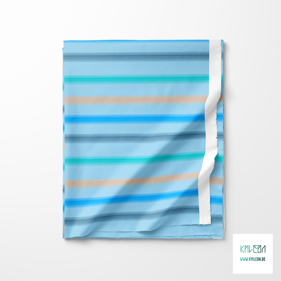 Soft horizontal stripes in blue, navy, orange and teal fabric