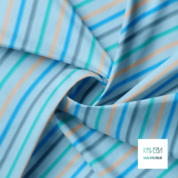 Soft horizontal stripes is blue, navy, orange and teal fabric