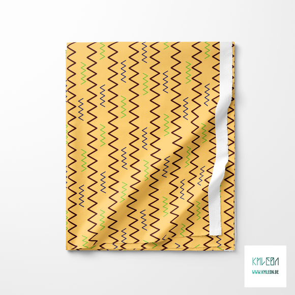 Brown, blue and green zig zag fabric