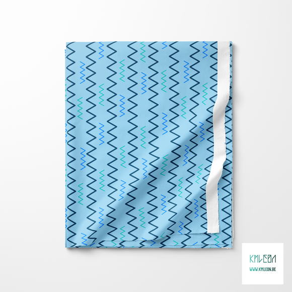 Blue, teal and navy zig zag fabric