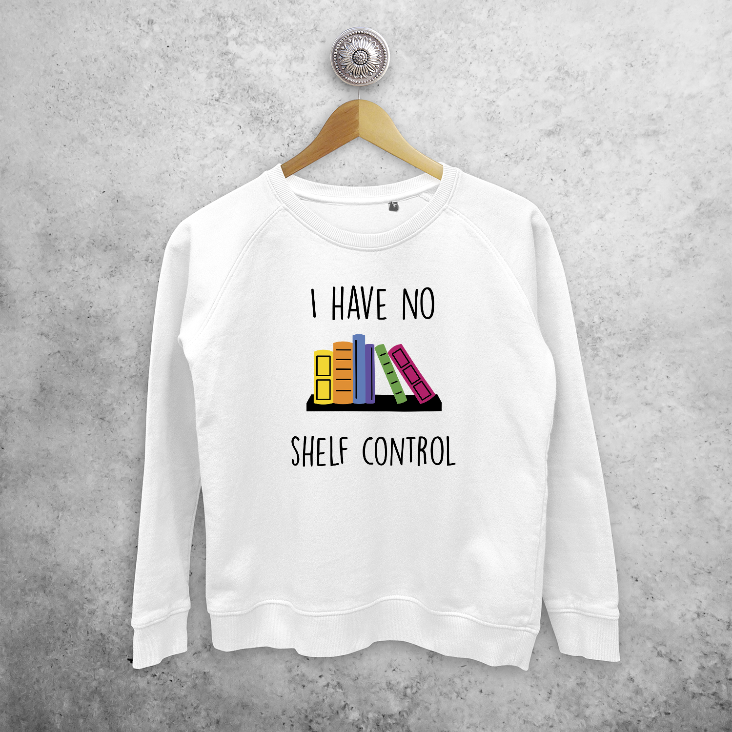 'I have no shelf control' sweater