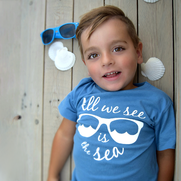 'All we see is the sea' kids shortsleeve shirt