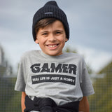 ‘Gamer – Real life is just a hobby’ kids shortsleeve shirt
