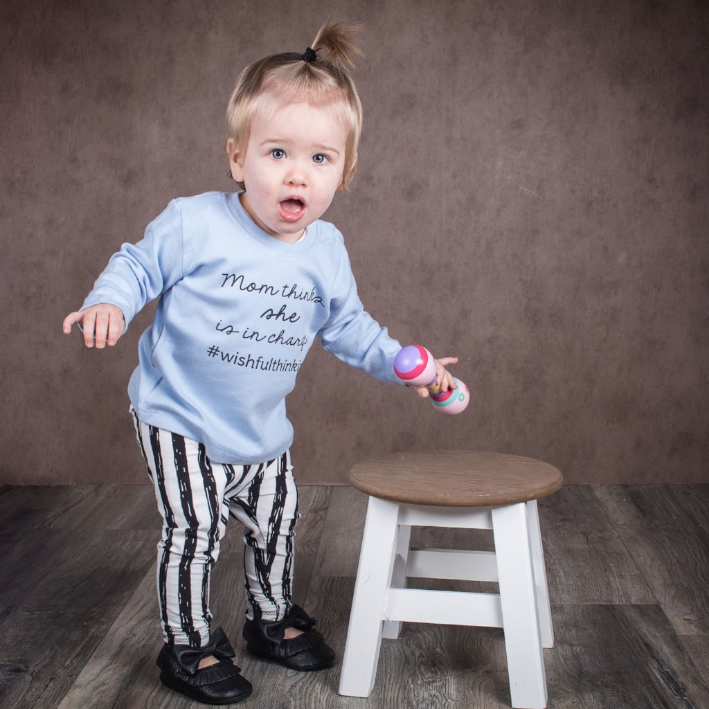 'Mom thinks she is in charge' baby longsleeve shirt