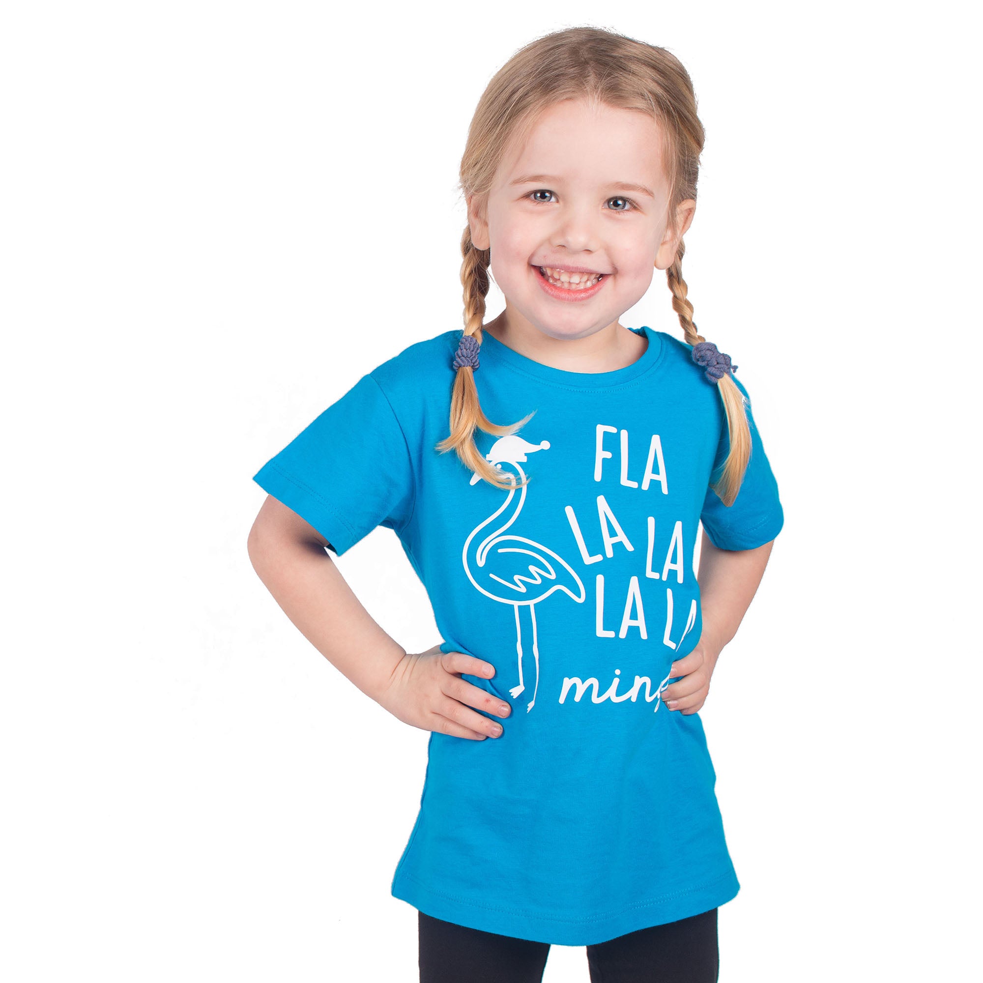 Smiling blonde girl with pigtails wearing aqua shirt with 'Fla la la la la mingo' print by KMLeon.
