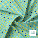Gele, donkerblauwe en blauwgroene vierkanten en strepen stof