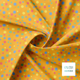Random blue, green, yellow and coral polka dots fabric