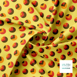 Orange, brown and red circles and triangles fabric